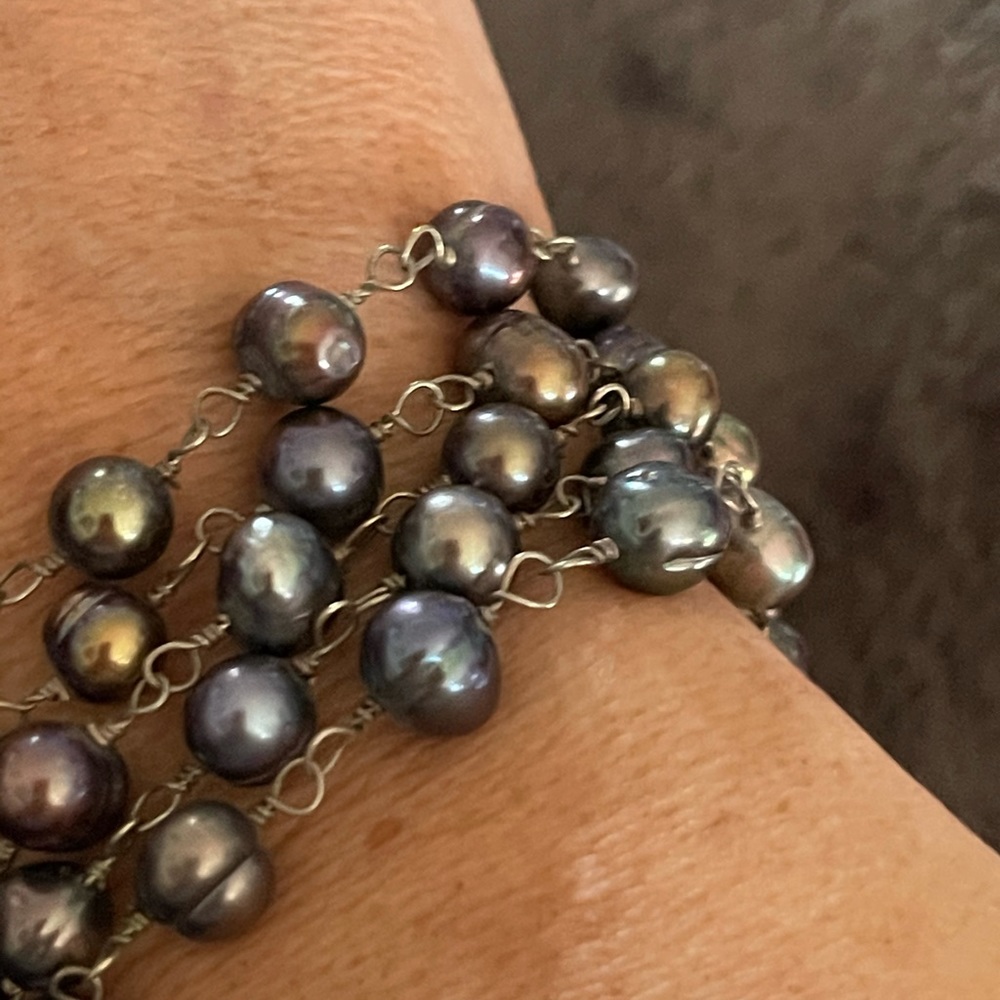 Sterling silver w/ freshwater pearls.
